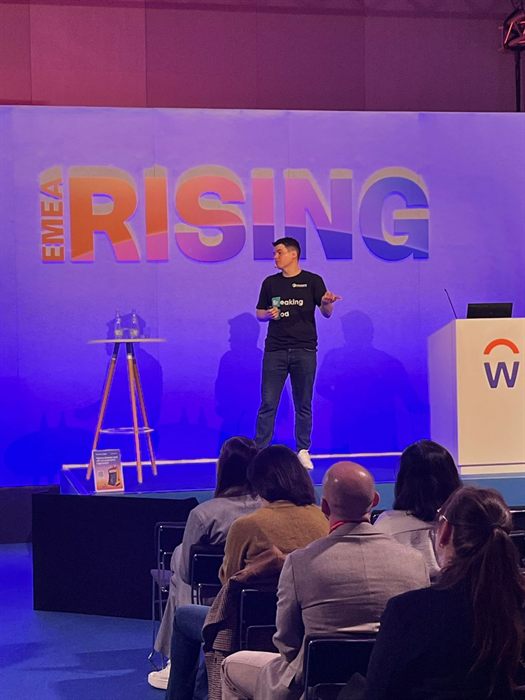 Matt Komendołowicz presenting on stage at Workday Rising EMEA